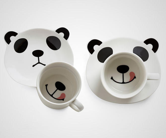 笑容滿面熊貓茶杯照片